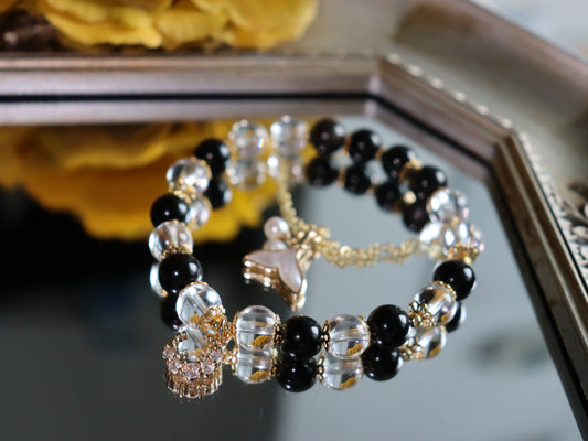 Elegant Obsidian & Rock Crystal Bracelet with 18K Gold Mother-of-Pearl Fish Tail and Moonstone Charm