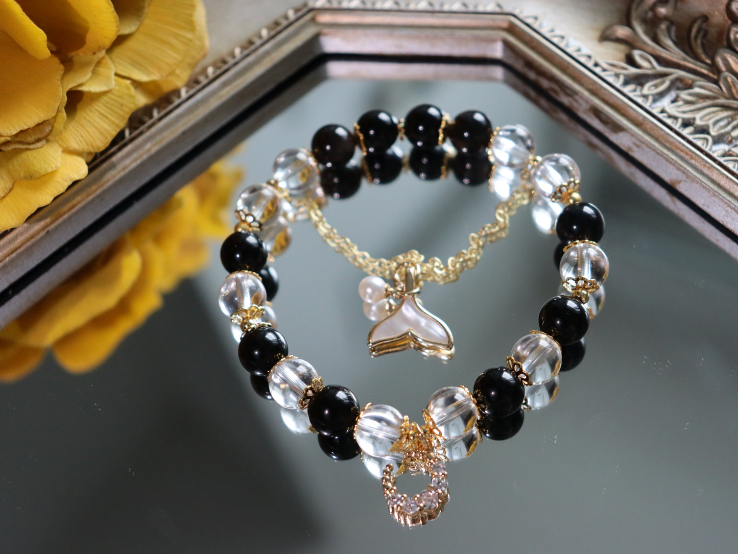 Elegant Obsidian & Rock Crystal Bracelet with 18K Gold Mother-of-Pearl Fish Tail and Moonstone Charm