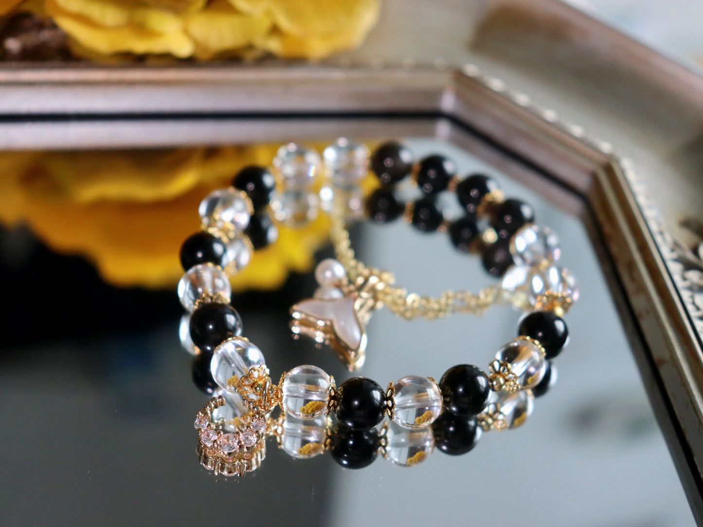 Elegant Obsidian & Rock Crystal Bracelet with 18K Gold Mother-of-Pearl Fish Tail and Moonstone Charm